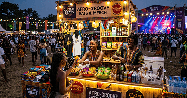 Food vendor serving customers at an event